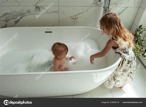 brother and sister in the shower|Sister Taking A Shower stock videos and footage